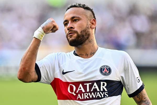 Paris Saint-Germain's Neymar celebrates after scoring a goal against Jeonbuk Hyundai Motors during their friendly football match  (Photo by ANTHONY WALLACE/AFP via Getty Images)