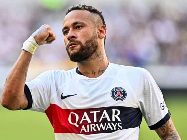 Paris Saint-Germain's Neymar celebrates after scoring a goal against Jeonbuk Hyundai Motors during their friendly football match  (Photo by ANTHONY WALLACE/AFP via Getty Images)