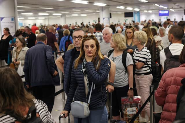 Queuing passengers at Gatwick Airport. (Photo by Dan Kitwood/Getty Images)