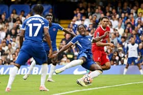Axel Disasi of Chelsea scores the team's first goal during the Premier League match  (Photo by Shaun Botterill/Getty Images)