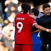 : Mauricio Pochettino, Manager of Chelsea, interacts with Darwin Nunez of Liverpool after the draw  (Photo by Clive Mason/Getty Images)