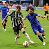 Miguel Almiron of Newcastle United is challenged by Marc Cucurella of Chelsea during the Premier League (Photo by Kevin C. Cox/Getty Images for Premier League)