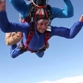 Hilary Oxley, from Romford, during her skydive. (Photo by Chelsea Tooley / Headcorn / SWNS)