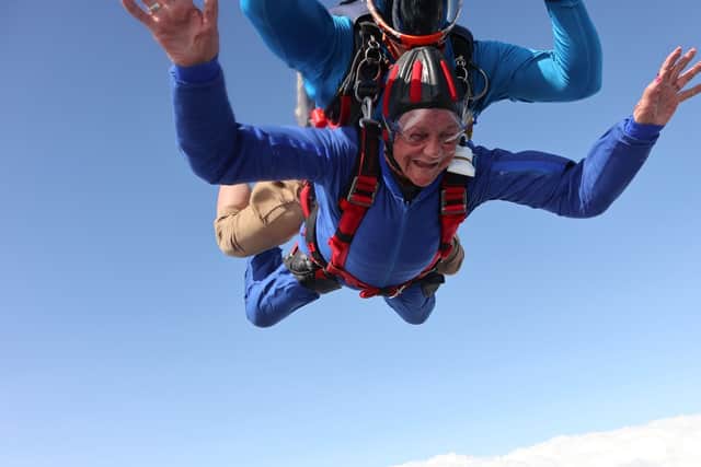 Hilary Oxley, from Romford, during her skydive. (Photo by Chelsea Tooley / Headcorn / SWNS)