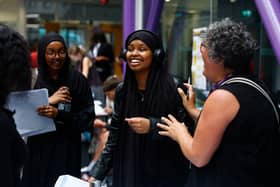 Student Rayaan Mahamoud celebrates her A Level results with a member of teaching staff at City of London Academy. (Photo by Peter Nicholls/Getty Images)