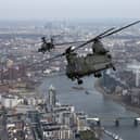Stock image of a Royal Air Force Chinook helicopter over London. (Photo by CARL COURT/AFP via Getty Images)