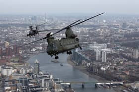 Stock image of a Royal Air Force Chinook helicopter over London. (Photo by CARL COURT/AFP via Getty Images)