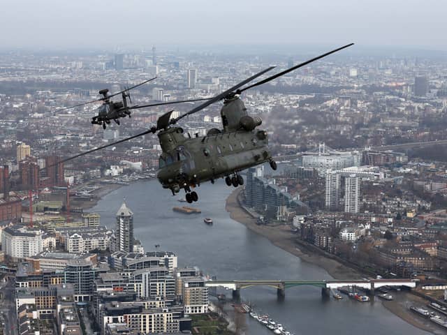 Stock image of a Royal Air Force Chinook helicopter over London. (Photo by CARL COURT/AFP via Getty Images)