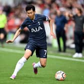 Heung-Min Son of Tottenham Hotspur runs with the ball during the Premier League match  (Photo by Mike Hewitt/Getty Images)