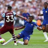 Emerson Palmieri of West Ham United is challenged by Carney Chukwuemeka of Chelsea  (Photo by Clive Rose/Getty Images)