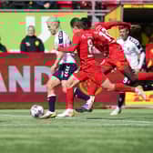 Aarhus Gymnastikforening’s English midfielder Jack Wilshere (C) runs with the ball during the Danish Superliga match (Photo by CLAUS BECH/Ritzau Scanpix/AFP via Getty Images)