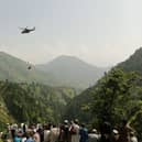 Eight people have been rescued after being trapped inside a cable car in Pakistan