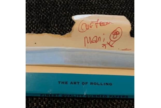 A king-size blue Rizla packet signed by Mani of the Stone Roses and Primal Scream. (Photo by André Langlois)