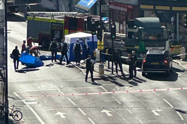 A blue tent was seen being put up on Peckham High Street following the incident. Credit: LondonWorld.