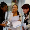Nada Tazouti (centre) celebrates her GCSE results at the City of London Academy. (Photo by Peter Nicholls/Getty Images)