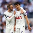  James Maddison of Tottenham Hotspur celebrates with teammate Heung-Min Son following the team’s victory (Photo by Clive Rose/Getty Images)