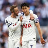 James Maddison of Tottenham Hotspur celebrates with teammate Heung-Min Son following the team’s victory (Photo by Clive Rose/Getty Images)