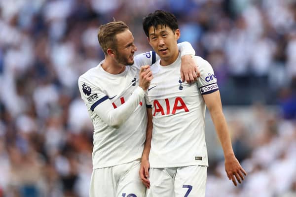  James Maddison of Tottenham Hotspur celebrates with teammate Heung-Min Son following the team’s victory (Photo by Clive Rose/Getty Images)