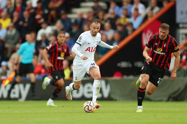  James Maddison of Tottenham Hotspur on the ball ahead of Illya Zabarnyi of AFC Bournemouth (Photo by Luke Walker/Getty Images)