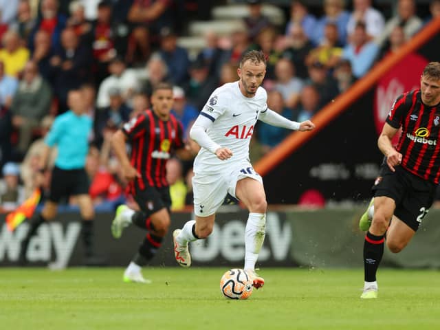  James Maddison of Tottenham Hotspur on the ball ahead of Illya Zabarnyi of AFC Bournemouth (Photo by Luke Walker/Getty Images)