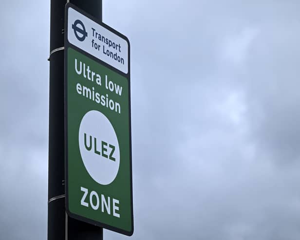A sign for the Ultra Low Emission Zone (ULEZ) is pictured near Hanger Lane in west London. Credit: Justin Tallis/AFP via Getty Images.