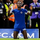 Nicolas Jackson of Chelsea celebrates after scoring the team’s third goal during the Premier League match . (Photo by Clive Mason/Getty Images)
