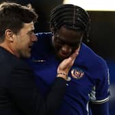 Chelsea's Argentinian head coach Mauricio Pochettino speaks to Chelsea's French defender #02 Axel Disasi at the end (Photo by HENRY NICHOLLS/AFP via Getty Images)