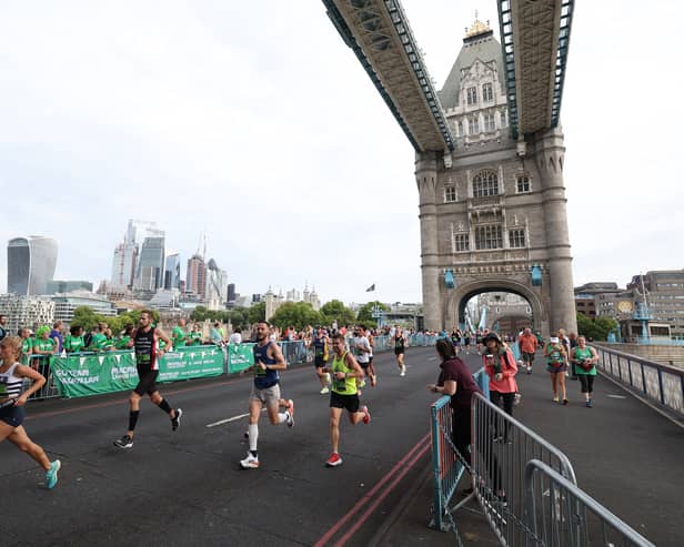 Runners pass Tower Bridge as part of The Big Half. Credit: Richard Heathcote/Getty Images.