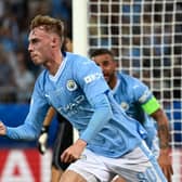 Manchester City's English midfielder #80 Cole Palmer celebrates scoring his team's first goal during the 2023 UEFA Super Cup  (Photo by ARIS MESSINIS/AFP via Getty Images)