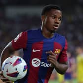 Barcelona’s Spanish forward #10 Ansu Fati runs with the ball during the Spanish Liga football match (Photo by LLUIS GENE/AFP via Getty Images)