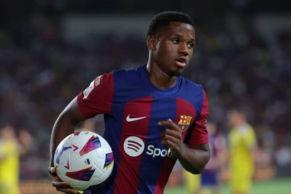 Barcelona’s Spanish forward #10 Ansu Fati runs with the ball during the Spanish Liga football match (Photo by LLUIS GENE/AFP via Getty Images)