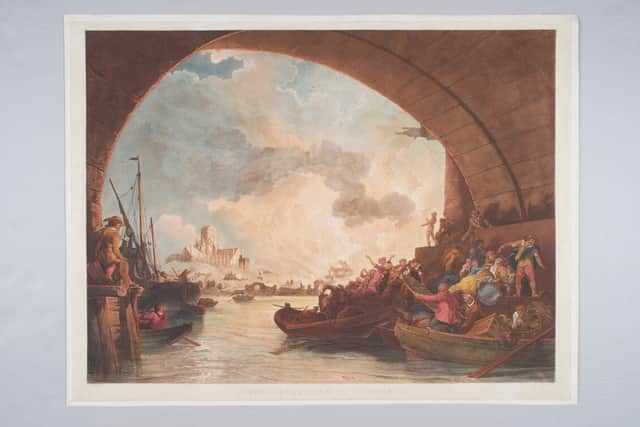 People attempting to escape the Great Fire of London by boat. Credit: Museum of London