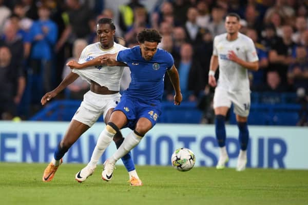 AFC Wimbledon’s England forward #11 Josh Neufville (L) fights for the ball with Chelsea’s English defender (Photo by DANIEL LEAL/AFP via Getty Images)
