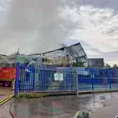 Smoke was continuing to come out of the top of the building in Herne Hill into late morning on September 8. Credit: Ben Lynch.