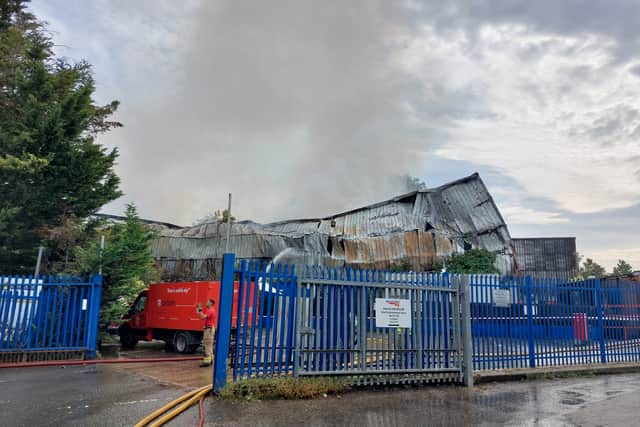 Smoke was continuing to come out of the top of the building in Herne Hill into late morning on September 8. Credit: Ben Lynch.
