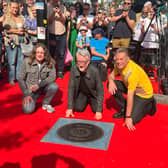 Billy Bragg’s stone on Camden Town’s Music Walk of Fame. The singer is pictured at the unveiling with Jamie Webster and Chris Packham. (Photo by André Langlois)