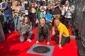 Billy Bragg’s stone on Camden Town’s Music Walk of Fame. The singer is pictured at the unveiling with Jamie Webster and Chris Packham. (Photo by André Langlois)