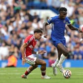 Nicolas Jackson of Chelsea moves away from Morgan Gibbs-White during the Premier League match  (Photo by David Rogers/Getty Images)