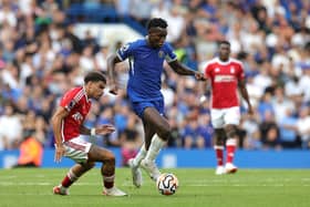 Nicolas Jackson of Chelsea moves away from Morgan Gibbs-White during the Premier League match  (Photo by David Rogers/Getty Images)