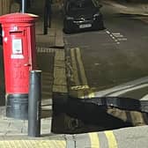 Residents on Dunvegan Road in Eltham, Greenwich, London awoke to discover a sinkhole the size of a small car opened up overnight on September 12.  (Photo by Andrew Hudson/SWNS)