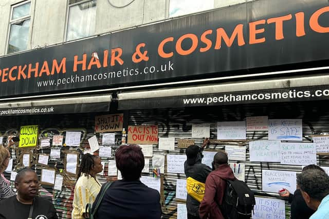 A crowd gathered in protest outside Peckham Hair and Cosmetics London. Credit: Jack Abela.