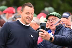 John Terry takes a selfie with a fan in Ireland in July (Image: Getty Images)