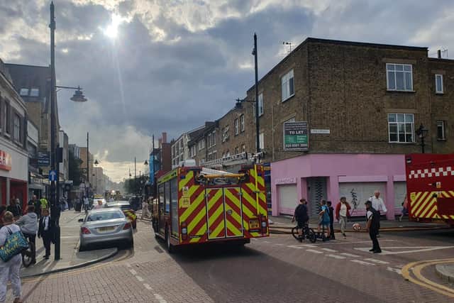 Ground floor shop with homes above it alight in east London 15 Ground floor shop with homes above it alight in east London