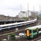 Trains head to Victoria station in London. (Photo by Daniel LEAL /AFP via Getty Images)