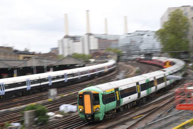 Trains head to Victoria station in London. (Photo by Daniel LEAL /AFP via Getty Images)