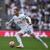 Tottenham Hotspur’s James Maddison runs with the ball against Sheffield United. (Photo by JUSTIN TALLIS / AFP / Getty)