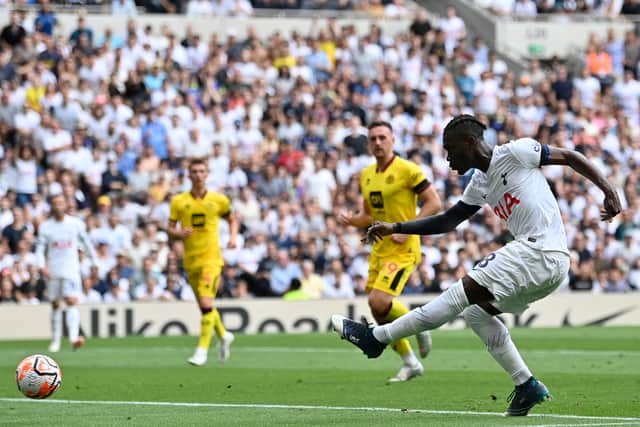 Tottenham Hotspur’s Ivorian-born Malian midfielder Yves Bissouma takes a shot. (Photo by JUSTIN TALLIS/AFP via Getty Images)