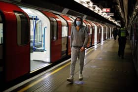 A TfL Tube platform. (Photo by Tolga AKMEN / AFP via Getty Images)