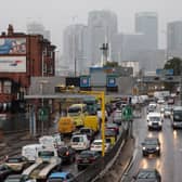 The Canary Wharf skyline is seen as vehicles queue on the Blackwall Tunnel approach in Greenwich in 2018. (Photo by Jack Taylor/Getty Images)