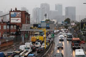The Canary Wharf skyline is seen as vehicles queue on the Blackwall Tunnel approach in Greenwich in 2018. (Photo by Jack Taylor/Getty Images)